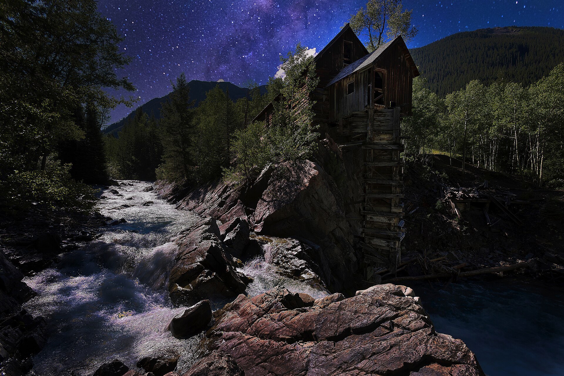 Crystal Mill under a starry night sky