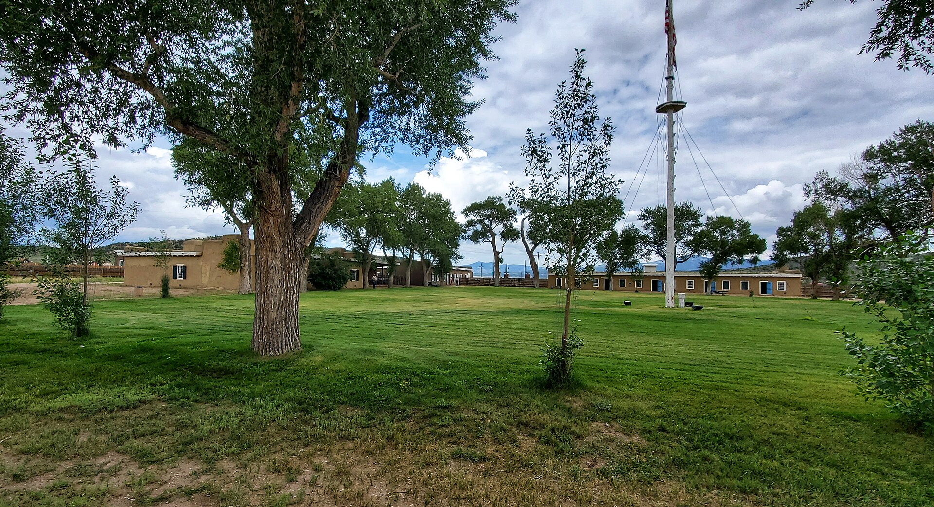 Parade ground and cottonwoods at Fort Garland Museum
