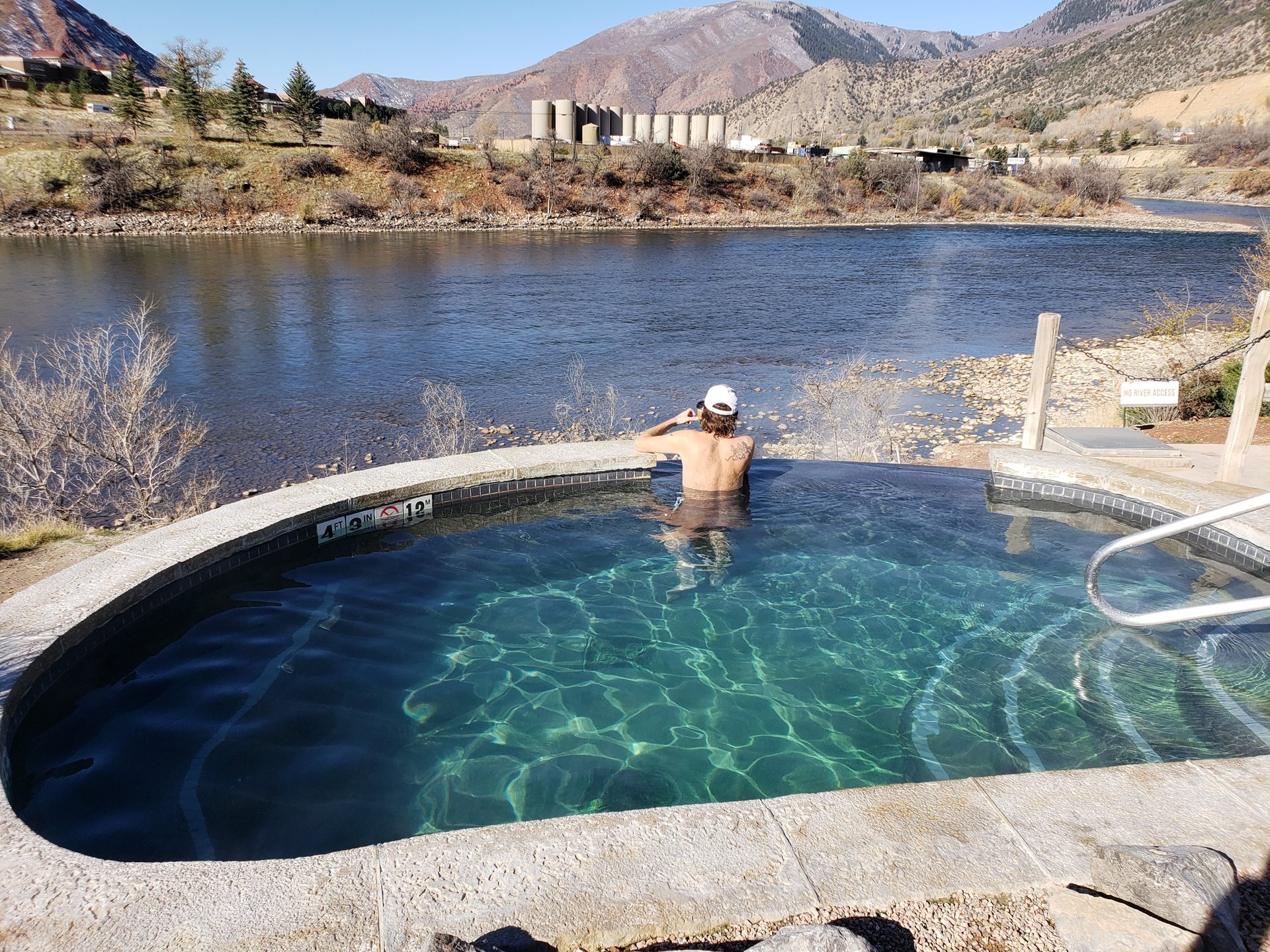 Iron Mountain Hot Springs – Bather in soaking pool at Iron Mountain Hot Springs