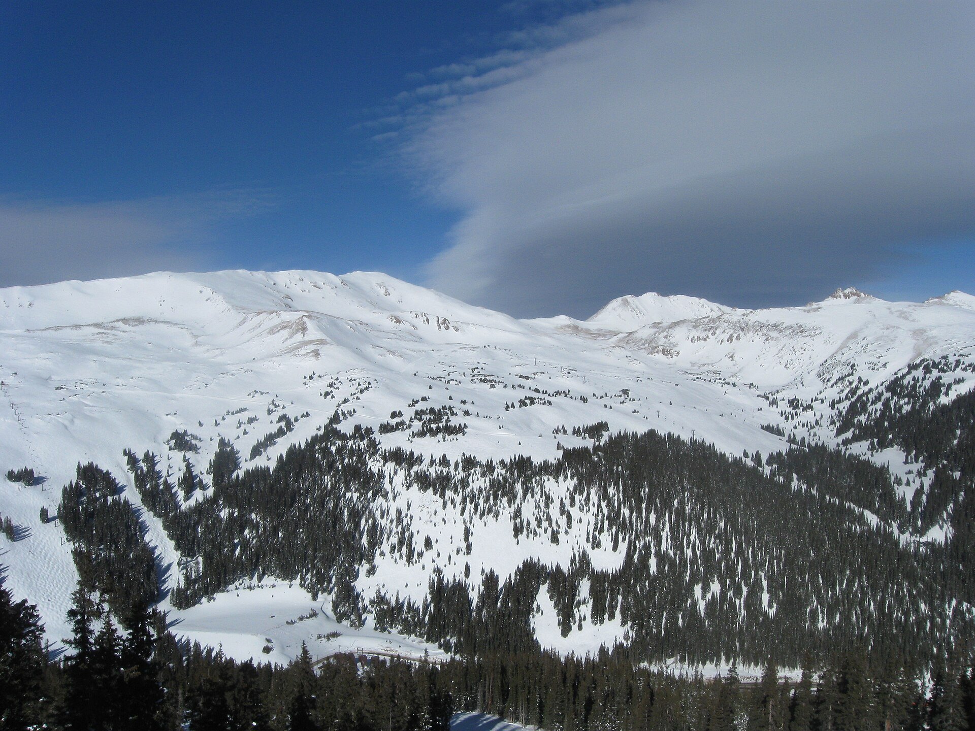 North view of snowy bowls and forest at Loveland Ski Area