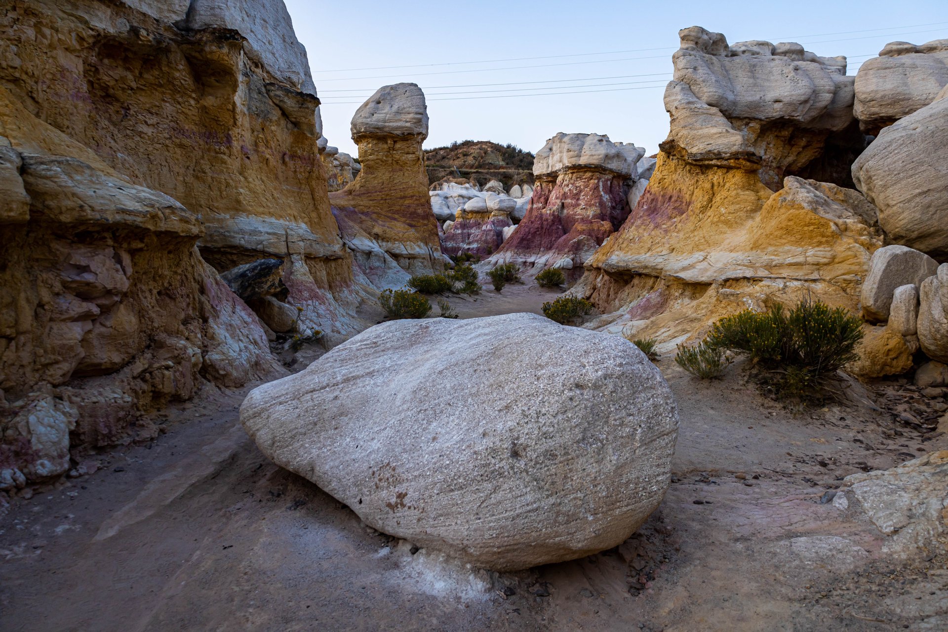 Paint Mines Interpretive Park – Sunrise at the Calhan Paint Mines. Calhan, Colorado, Rocks, Sky, Plants, Rabbits.