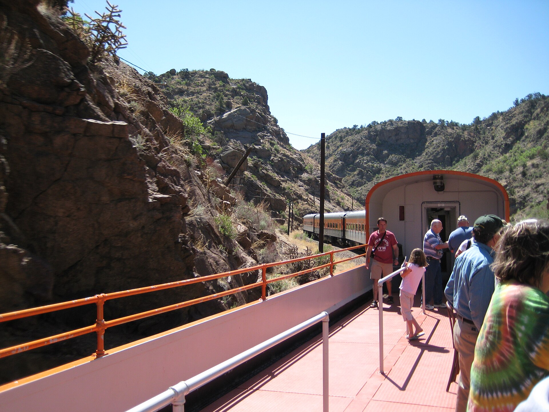 Passengers on the open-air car of the Royal Gorge Route train in the gorge