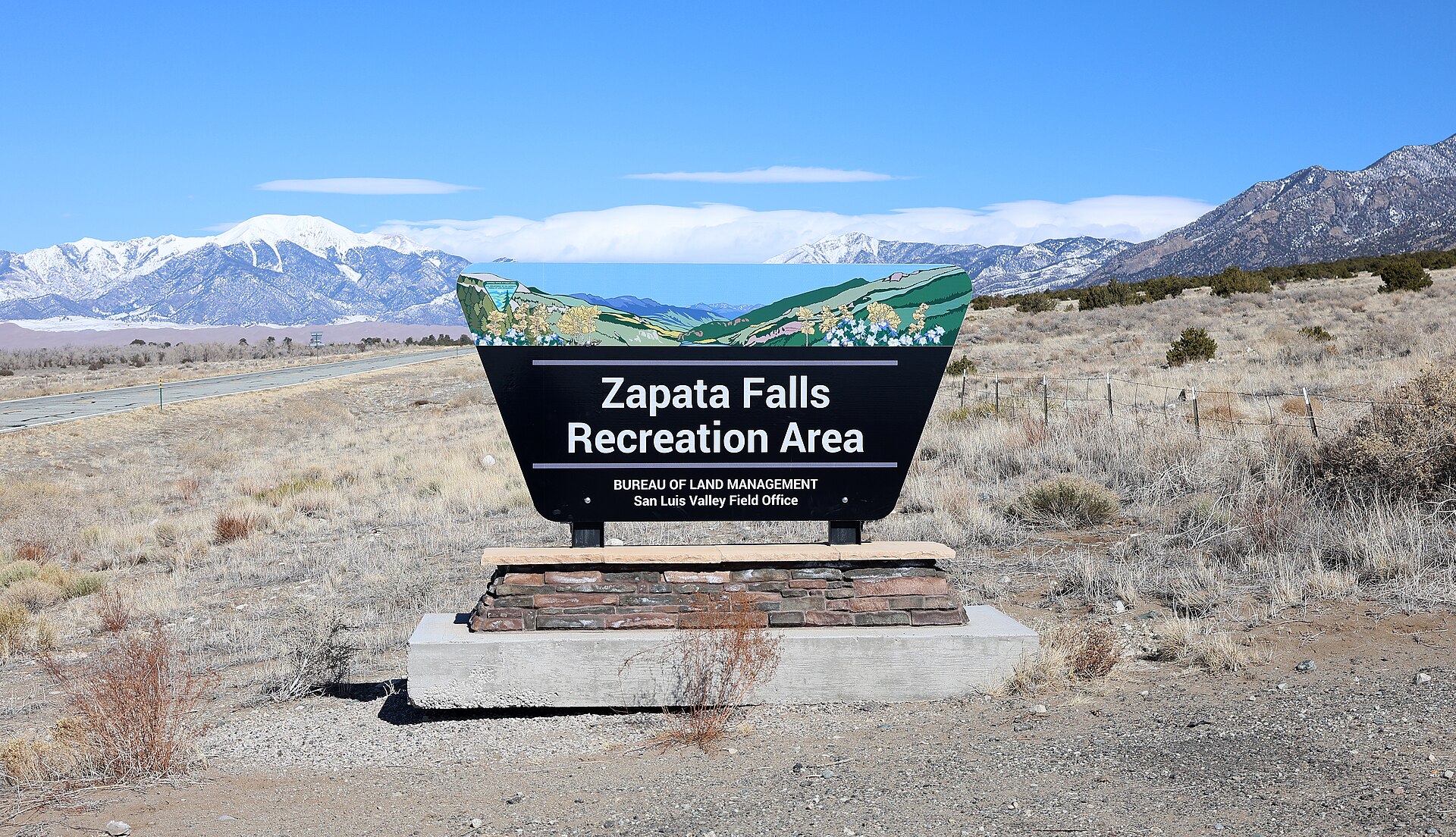 Zapata Falls Recreation Area entrance sign off Highway 150